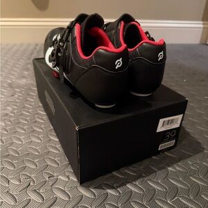 Peloton Black Shoes with Vibrant Red Lining